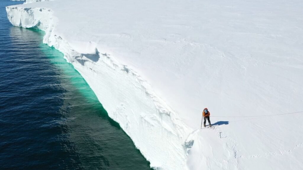 Bas-examining-ice-shelf-after-carving-antarctica-1200x675.jpg