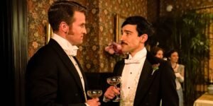 john-and-oscar-talk-in-the-gilded-age-1.jpg
