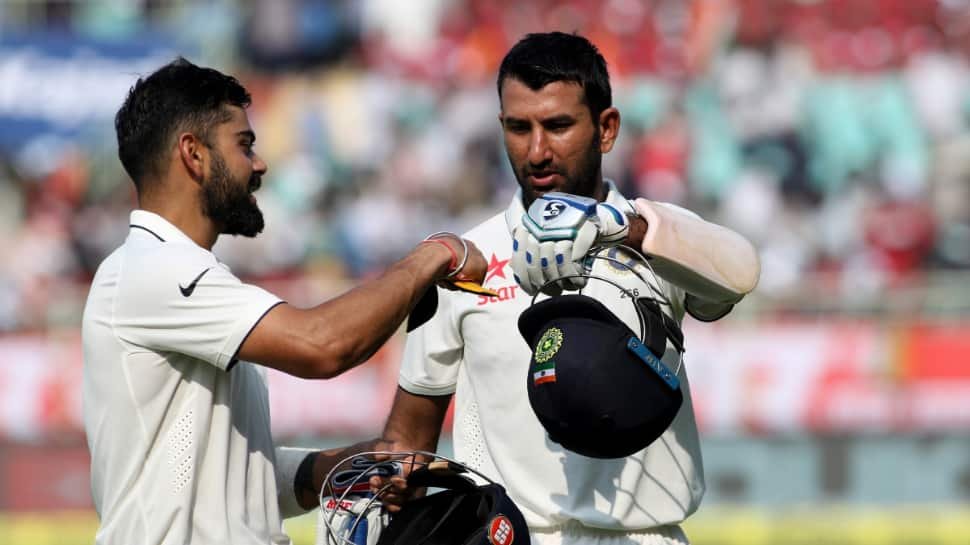 1818177-virat-kohli-pens-emotional-note-for-cheteshwar-pujara.jpg