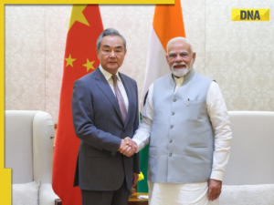2719541-pm-modi-with-wang-yi.png