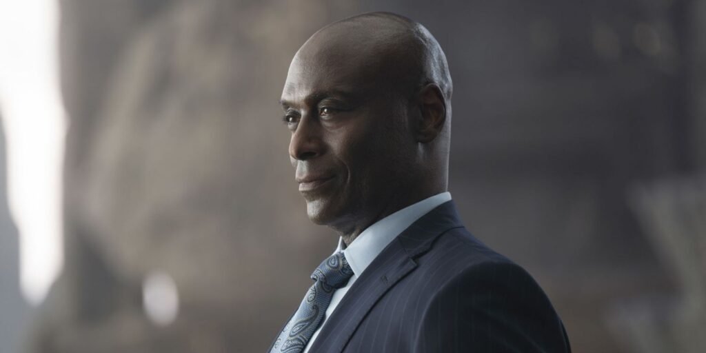 lance-reddick-smiling-as-zeus-1.jpg