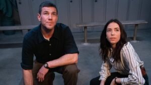 ncis-origins-austin-stowell-leroy-gibbs-mariel-molino-lala-dominguez-crouched-looking-up.jpg