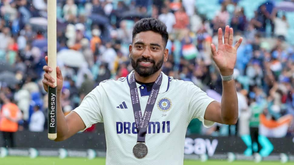 1829077-mohammed-siraj-icc.jpg