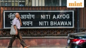 New-Delhi-A-man-walks-past-Niti-Aayog-in-New-Del_1743162284718_1772118104439.jpg